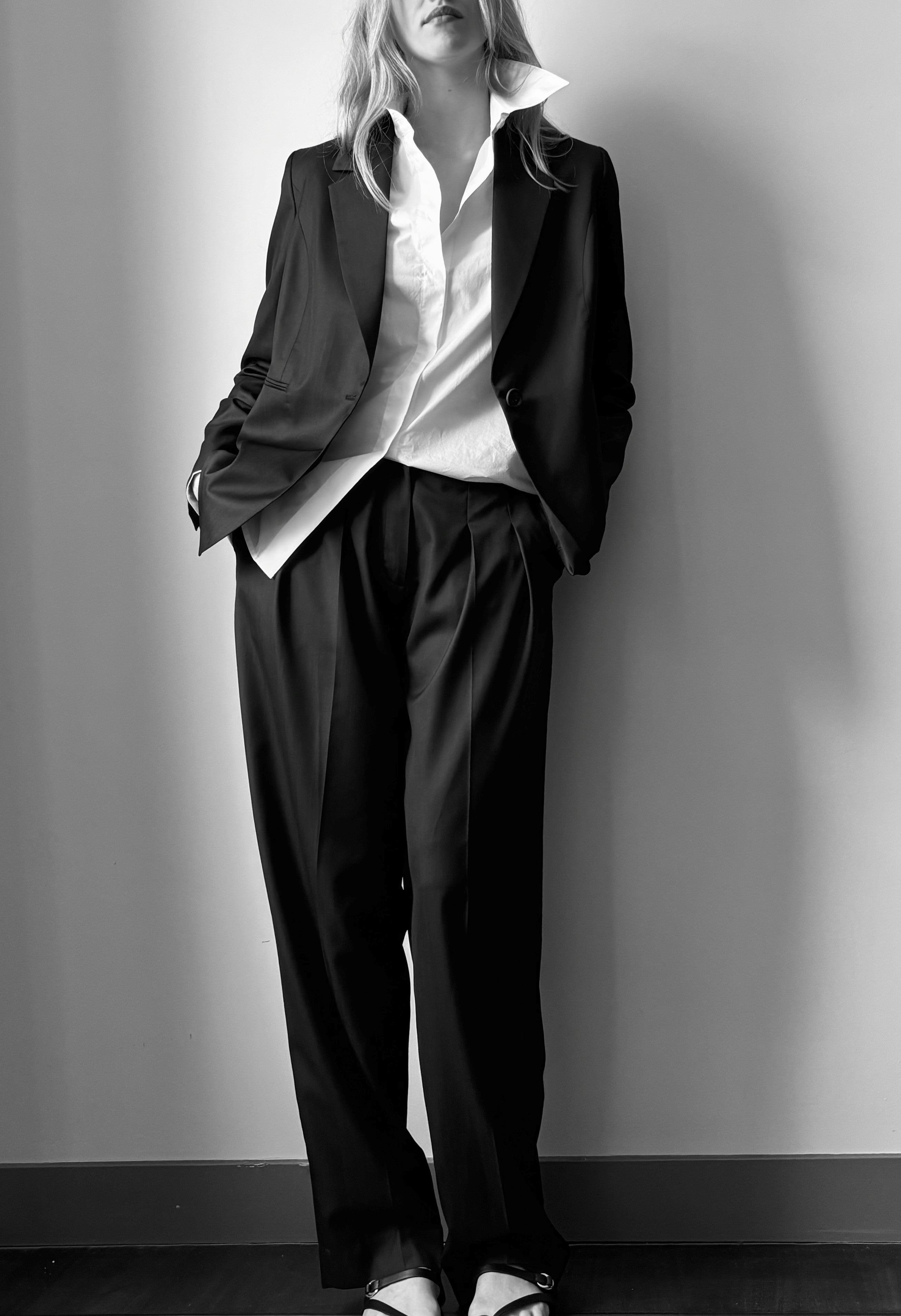 pleated trousers in nearly black